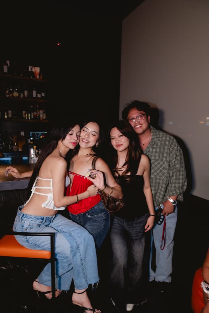Guests posing together at TONE Presents